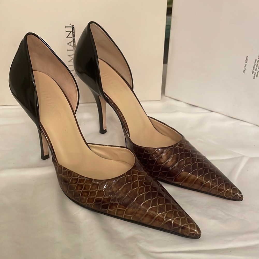 Lumiani patent leather size 8 brand new in original box. 3 1/2 inch heel.